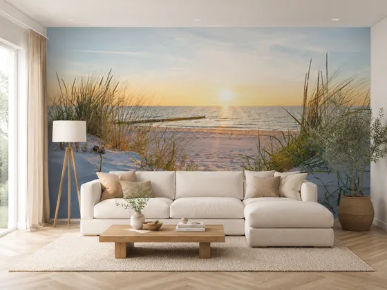 Fotobehang strand met zonsondergang op maat in een woonkamer